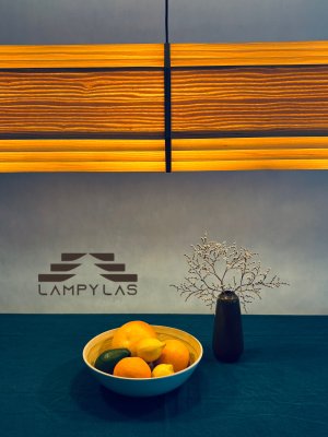 LampyLas Aurora Long detail on table logo